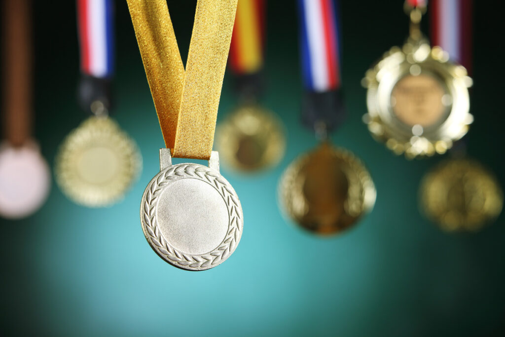 Images of medals hanging from an unseen support